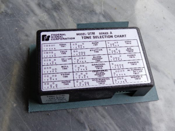 UTM: FEDERAL SIGNAL CORP, UNIVERSAL TONE MODULE, 18 SWITCHABLE TONES, PLUG-IN