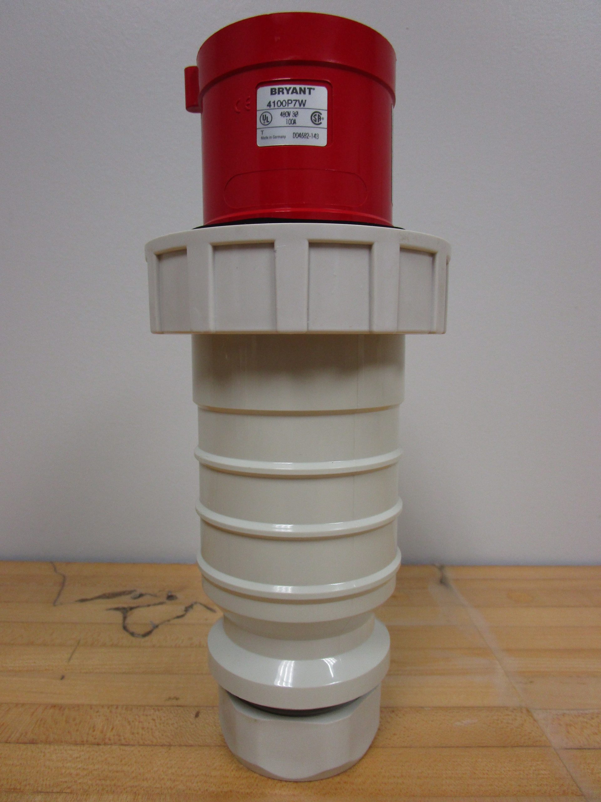 4100P7W: BRYANT, WATERTIGHT PLUG IEC 309 SERIES II PIN & SLEEVE 100 AMP, 3 PHASE, 3 POLE 4 WIRE GROUNDING.